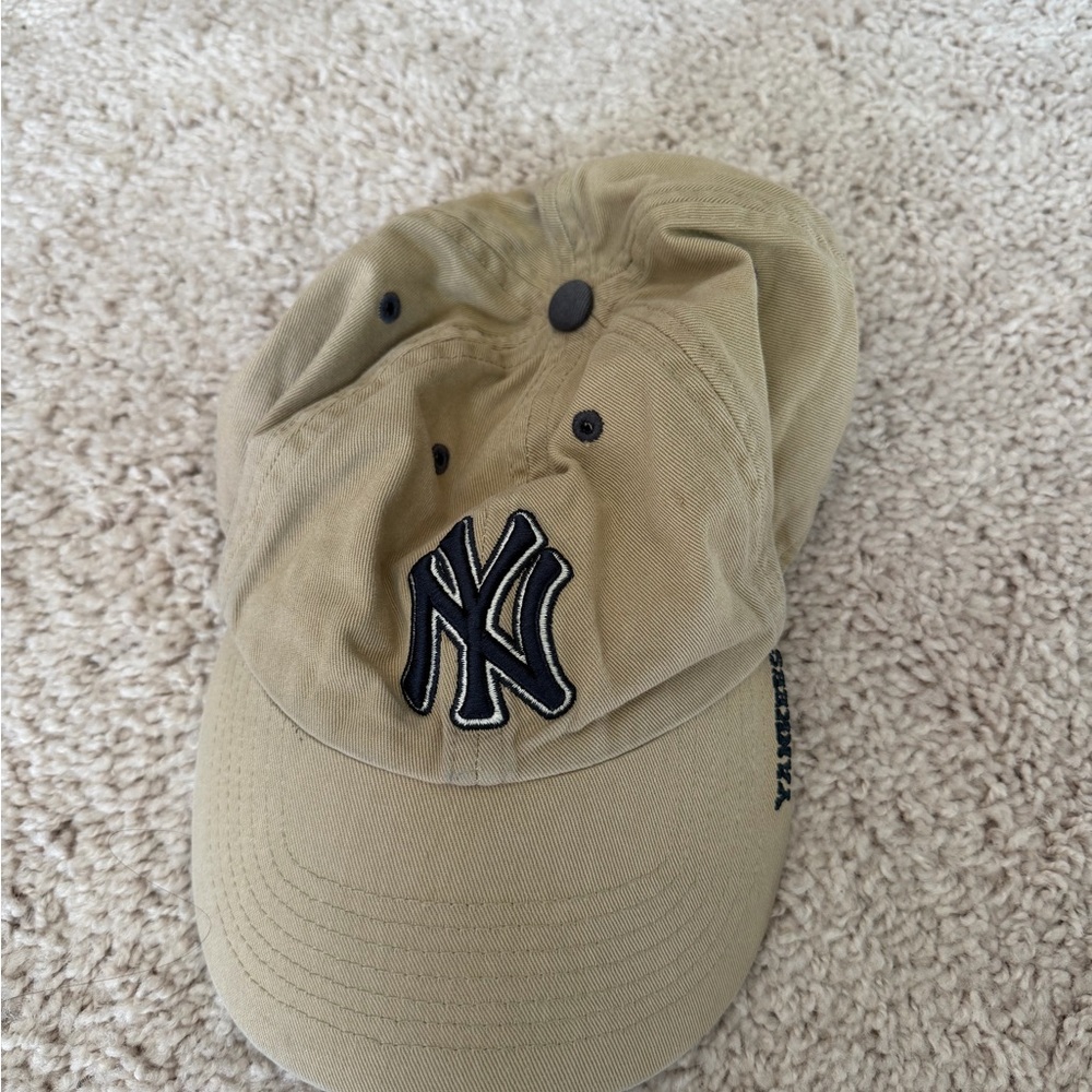 Vintage tan and navy Yankees baseball cap